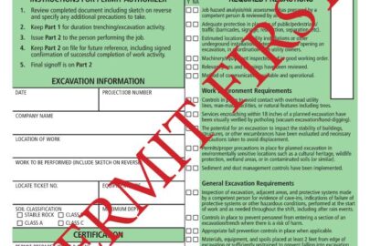 Completed excavation permit with stamps and markings indicating authorization
